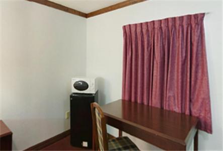 Executive Inn Muldrow Bagian luar foto