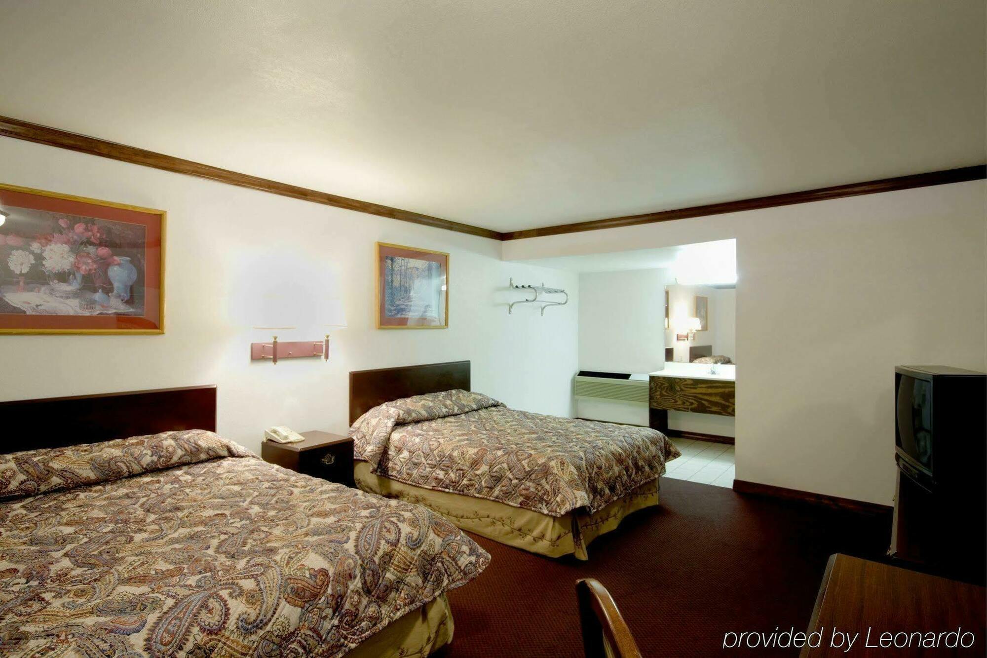 Executive Inn Muldrow Bagian luar foto